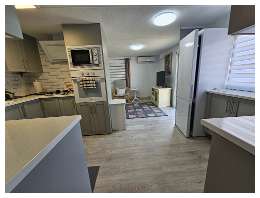 View into the kitchen and lounge