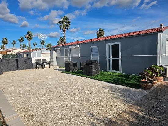 Outside of the mobile home : 2 bed, 2 bath mobile home for sale in Las Mimosas