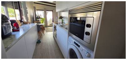 Kitchen with built in washing machine etc