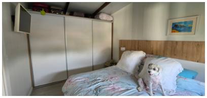 Master bedroom with wardrobes