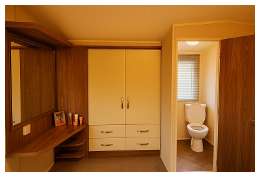 En suite and dressing area in master bedroom