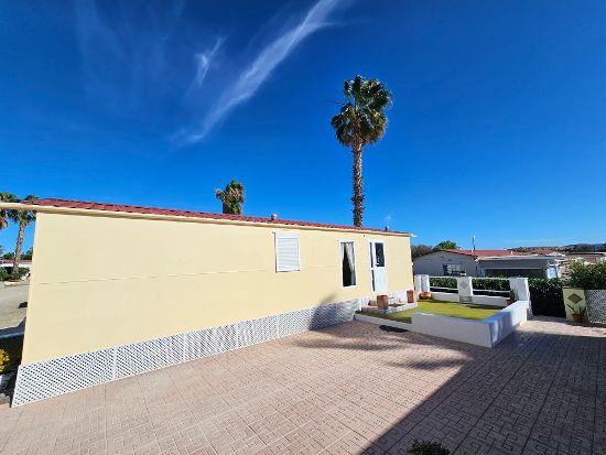 Outside of the mobile home : 2 bed, 1 bath mobile home for sale in Las Rosas